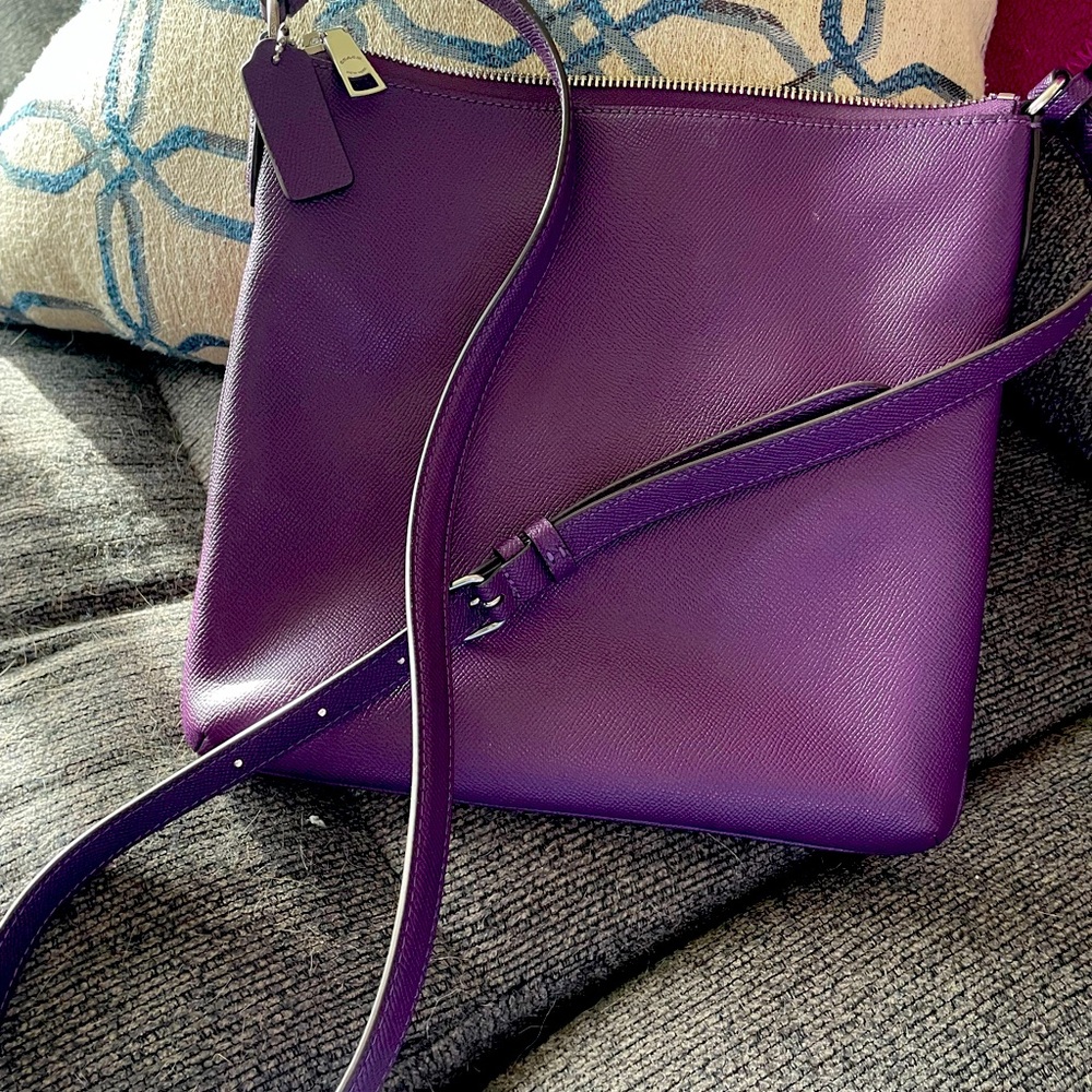 Brand new Coach crossbody plum colored purse